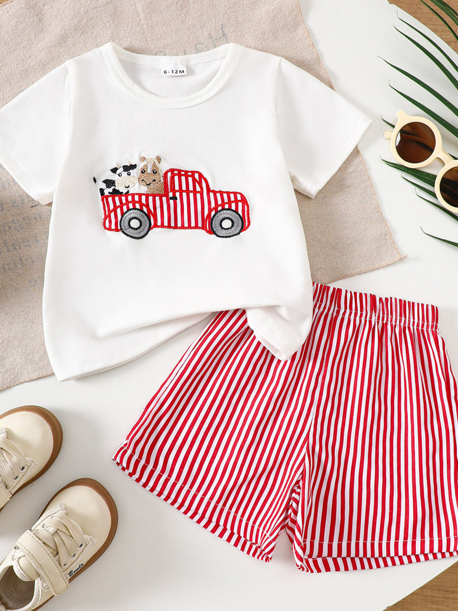 White baby tee with embroidered tractor, cow, and horse, paired with red striped shorts.