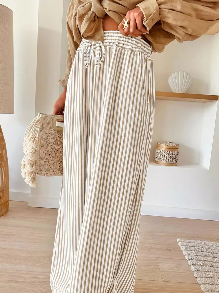 100% polyester Care instructions: Machine wash cold wide-leg pants in Pink with flared silhouette
