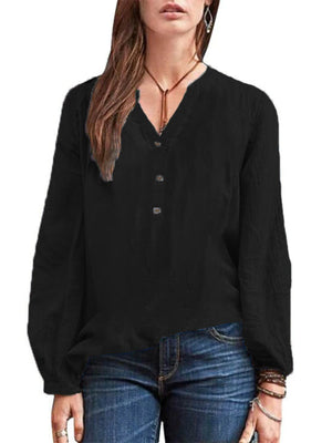 Black long-sleeve blouse with notched neckline and button detail
