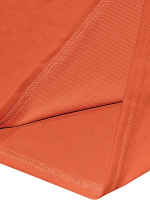 Orange v-neck tee and shorts set detail showing fabric texture and stitching.