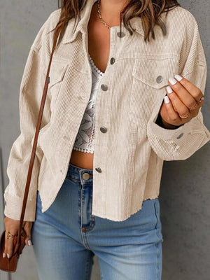 shacket in cream featuring buttoned and relaxed fit