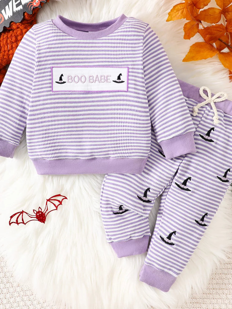 pajama set featuring striped in Light Purple with 65% cotton, 35% polyester Care instructions: Machine wash cold texture