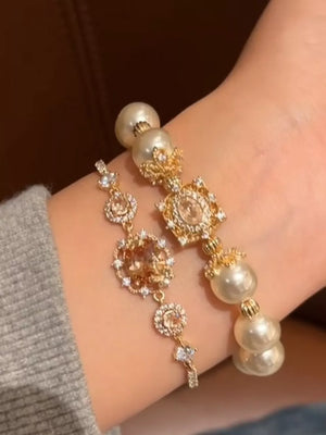 Synthetic Pearl,18K Gold-Plated,Alloy,Zircon Care instructions: Avoid wearing du bracelet in gold with regular silhouette