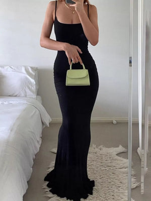 maxi dress in black featuring spaghetti strap and bodycon fit