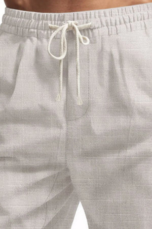 Light Gray textured cargo drawstring shorts with elastic waistband and tie.