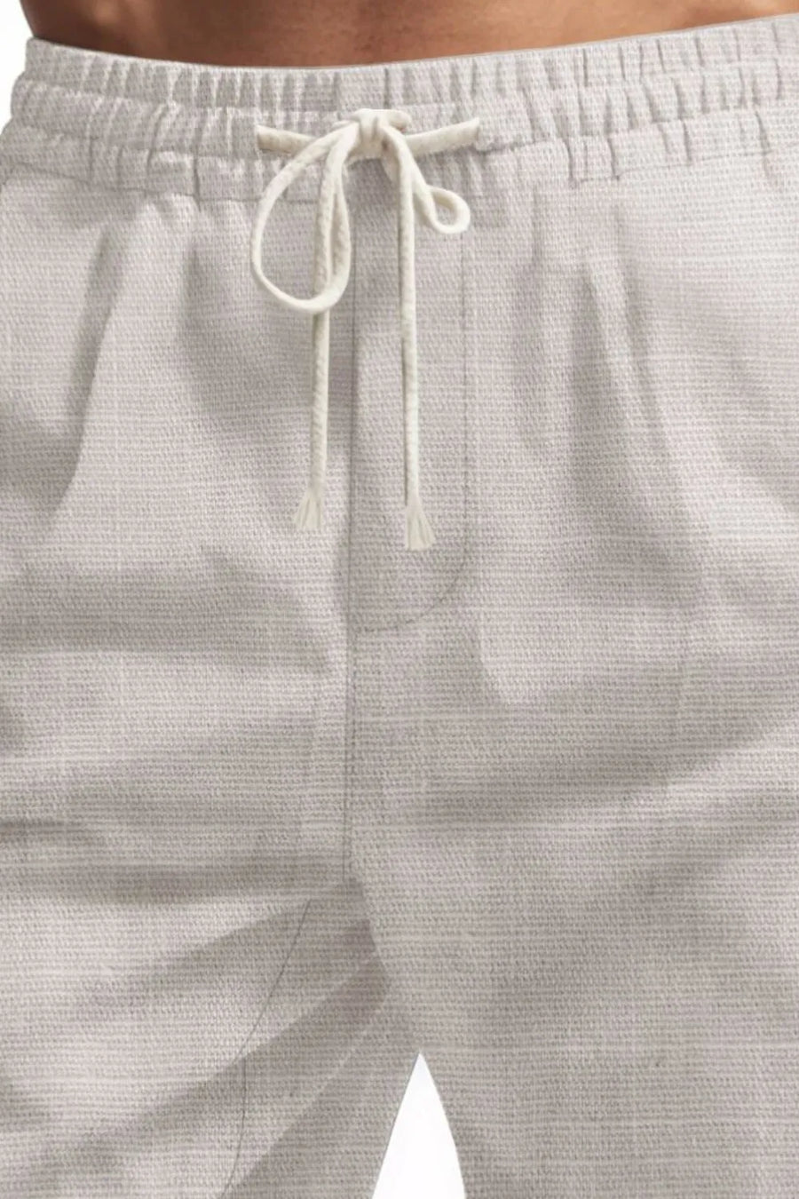 Light Gray textured cargo drawstring shorts with elastic waistband and tie.