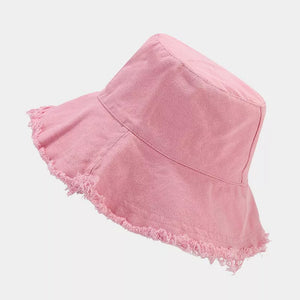 hat in blush pink featuring frayed and relaxed fit