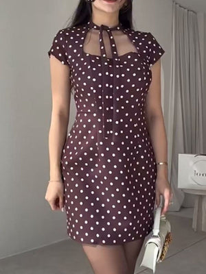 100% polyester Care instructions: Machine wash cold mini dress in Black with fitted silhouette