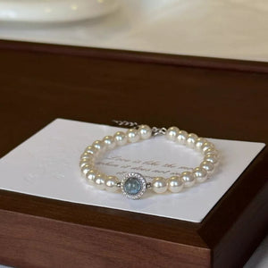 bracelet in cream featuring beaded and straight fit