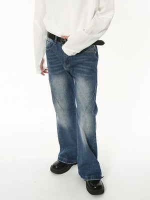 Faded flare jeans in medium wash denim with sculpted seam detail and a classic fit.