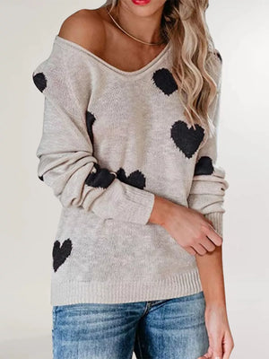 Black v-neck sweater with hip-length and pullover