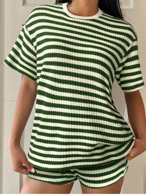 Green and white striped waffle knit loungewear set with crew neck top and shorts.