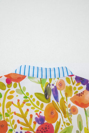 Cotton mini dress with vibrant floral print and blue striped collar detail.