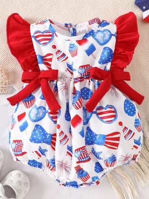 Baby patriotic print one-piece with ruffle sleeves and red bow accents.