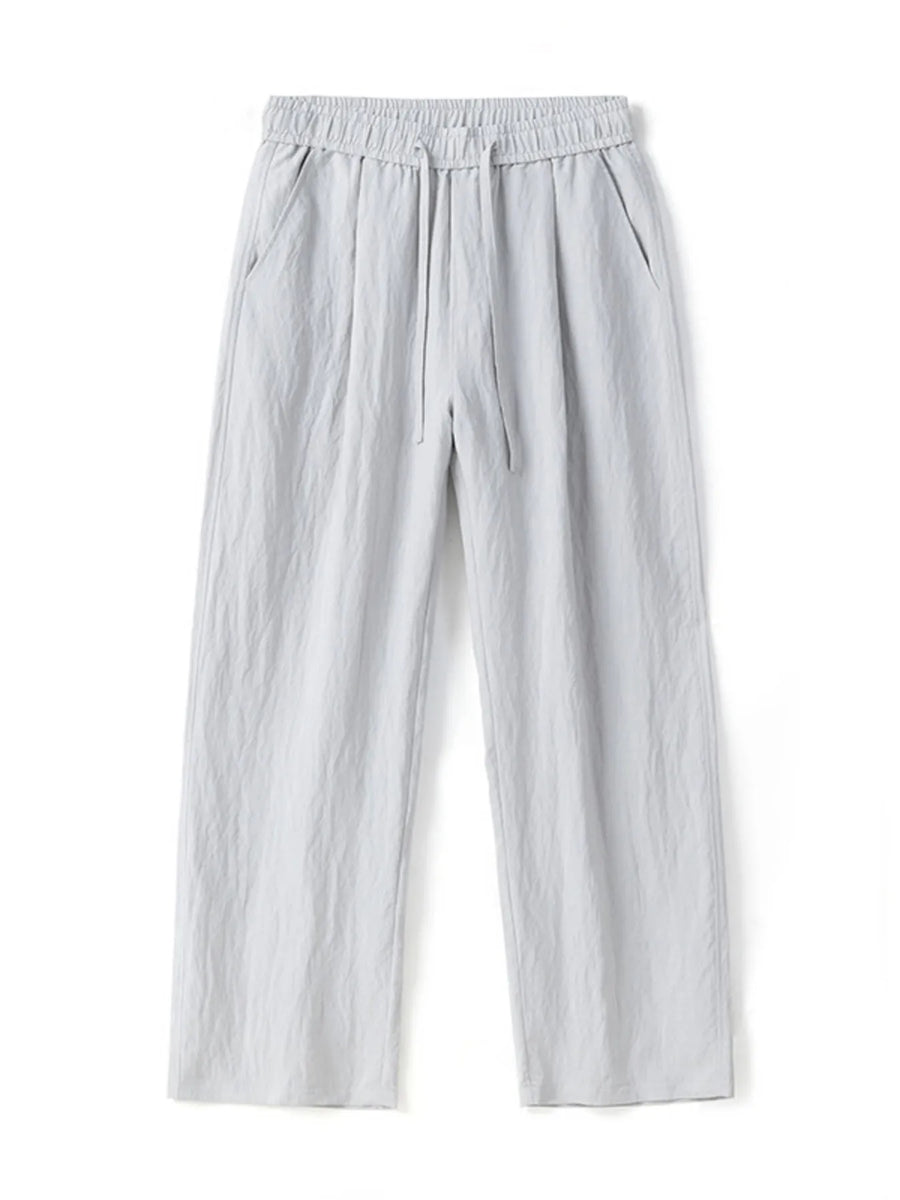 Lightweight wide-leg trousers in light gray with a drawstring waist and pockets.