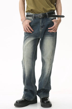 Panel seam washed denim trousers in dark blue with a relaxed fit and faded details.