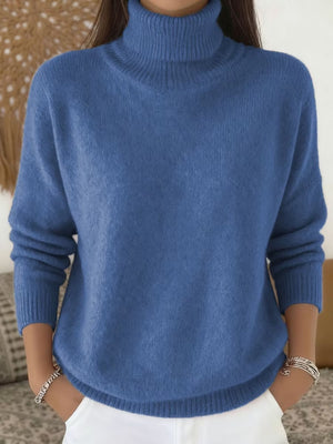 100% polyester Care instructions: Machine wash cold turtleneck sweater in Sky Blue with relaxed silhouette