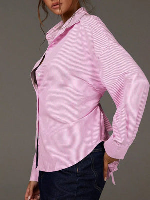 light blue button-down shirt with button-front and striped
