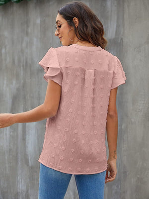 Flutter sleeve Swiss dot blouse in Dusty Pink with ruffled sleeves and a V-neck.