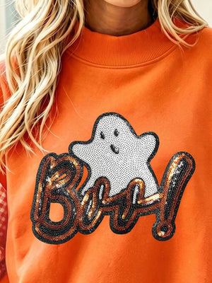 50% polyester, 50% cotton Care instructions: Machine wash cold sweatshirt in Orange with relaxed silhouette