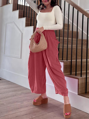 Linen balloon pants in strawberry with sculptural pocket detail.