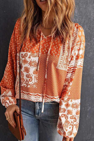 burnt orange blouse with paisley and v-neck