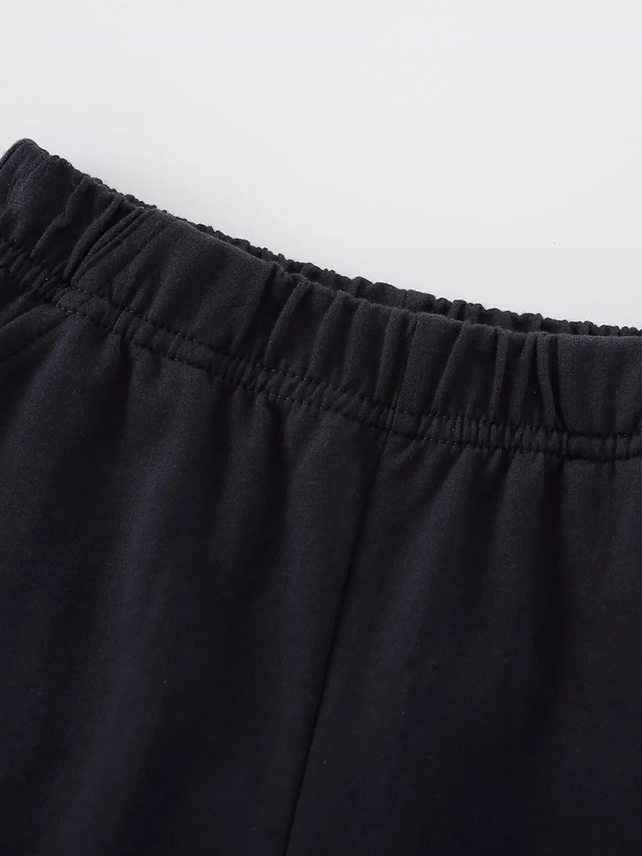 Black cotton toddler pants with elastic waistband detail