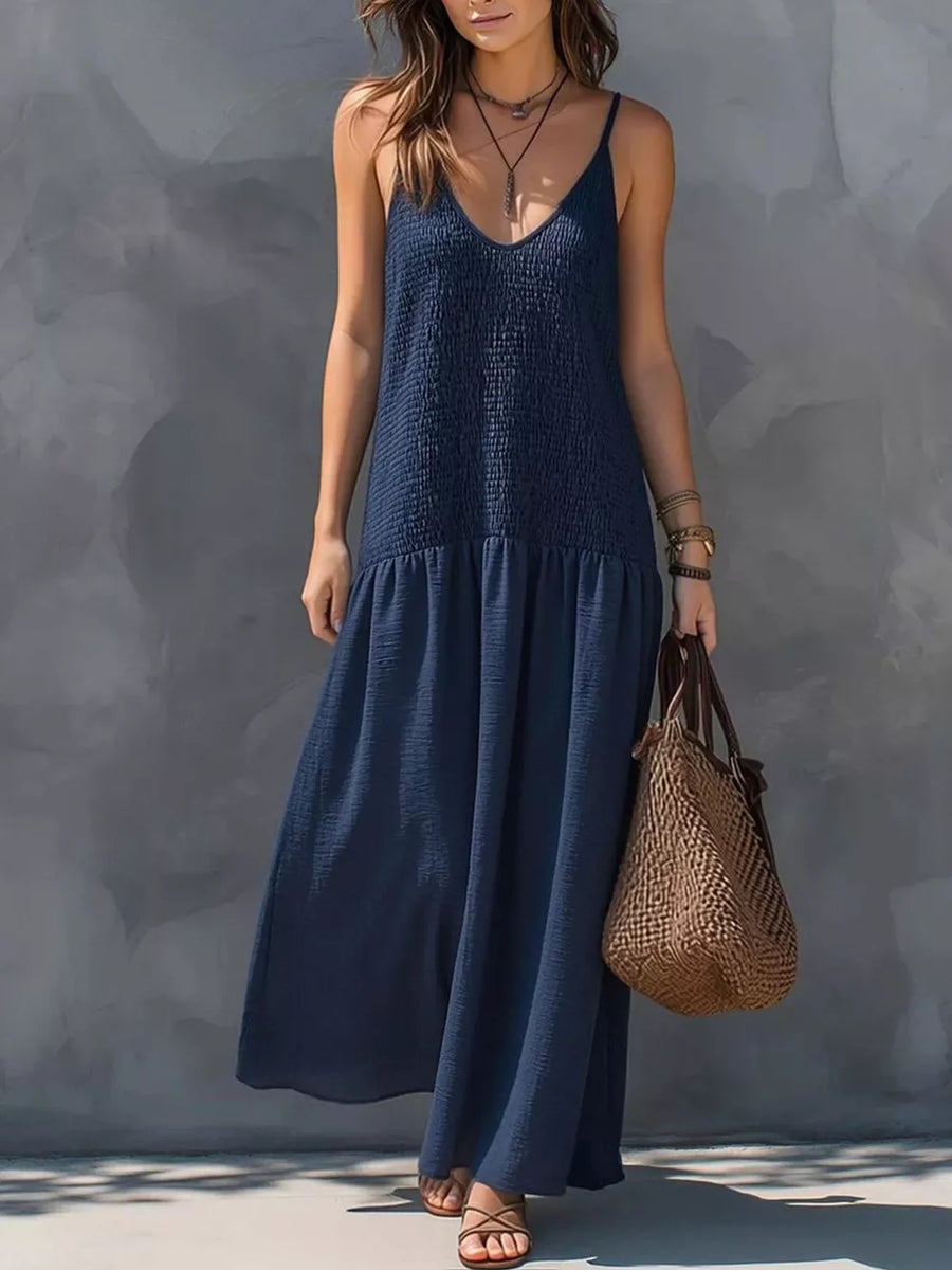 maxi dress in navy blue featuring smocked and A-line fit