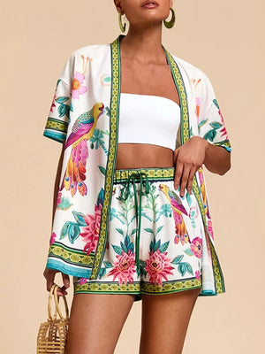 Tropical print kimono cardigan and drawstring shorts set with birds and flowers.