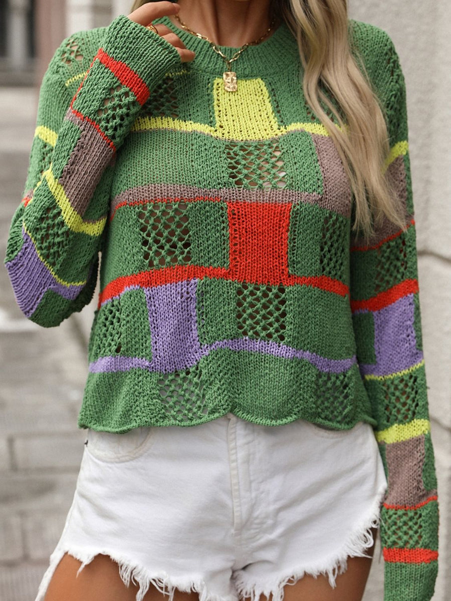 Green openwork knit sweater with colorful patchwork blocks and stripes, long sleeves, crew neck.