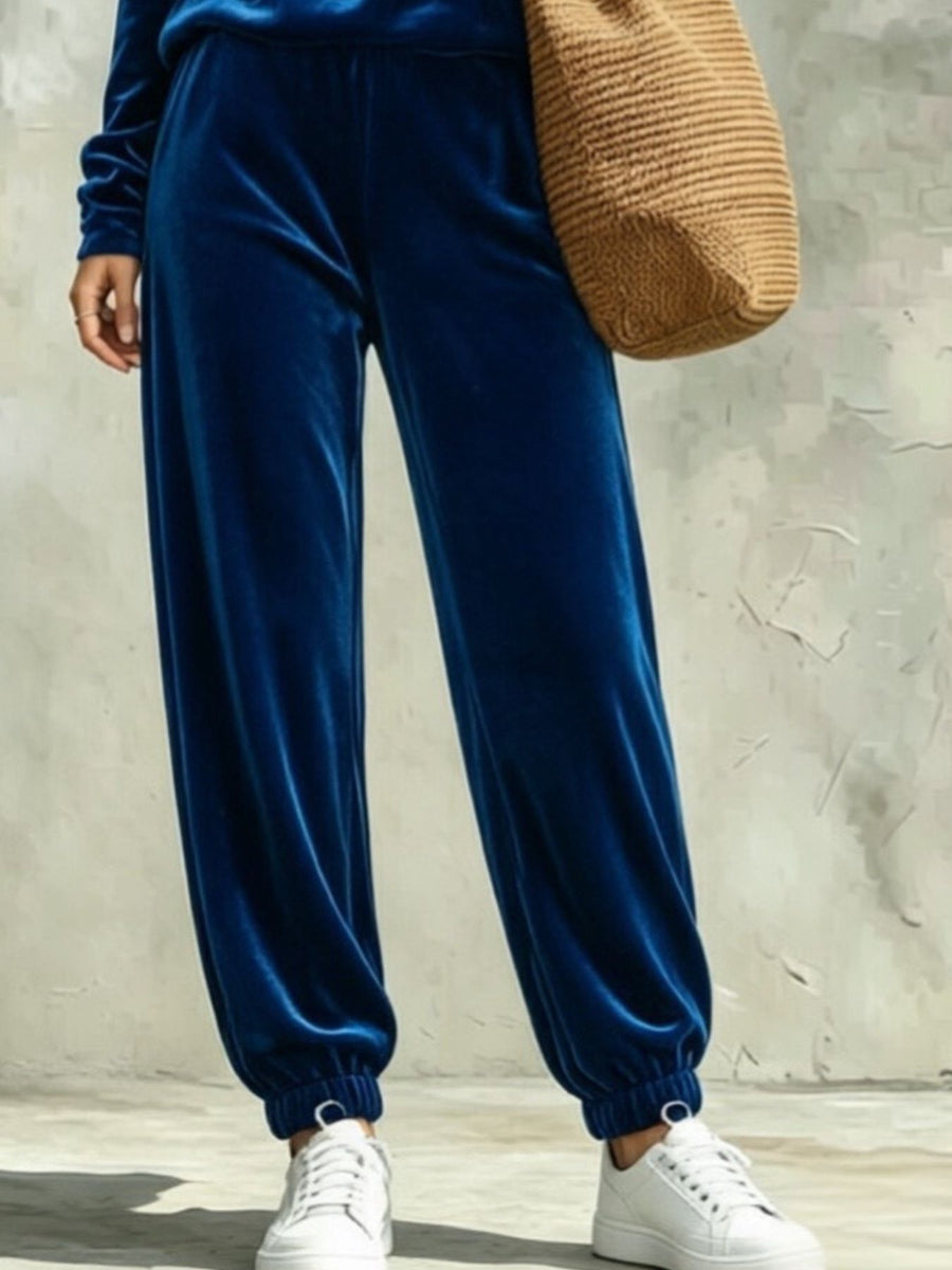 100% polyester Care instructions: Machine wash cold lounge set in Black with relaxed silhouette