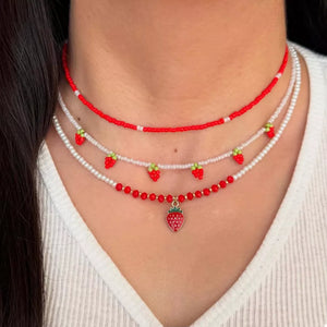 necklace in red featuring beaded and layered fit