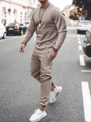 Men's mocha textured loungewear set with crew neck sweatshirt and drawstring joggers.