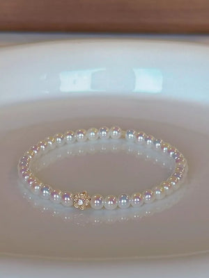 bracelet featuring floral in White with Synthetic Pearl,18K Gold-Plated,Alloy Care instructions: Avoid wearing during ex