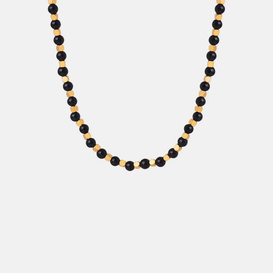 Black onyx and gold bead necklace with 18K gold accents.