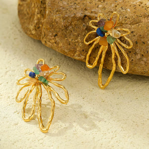 earrings in gold featuring natural stone and straight fit