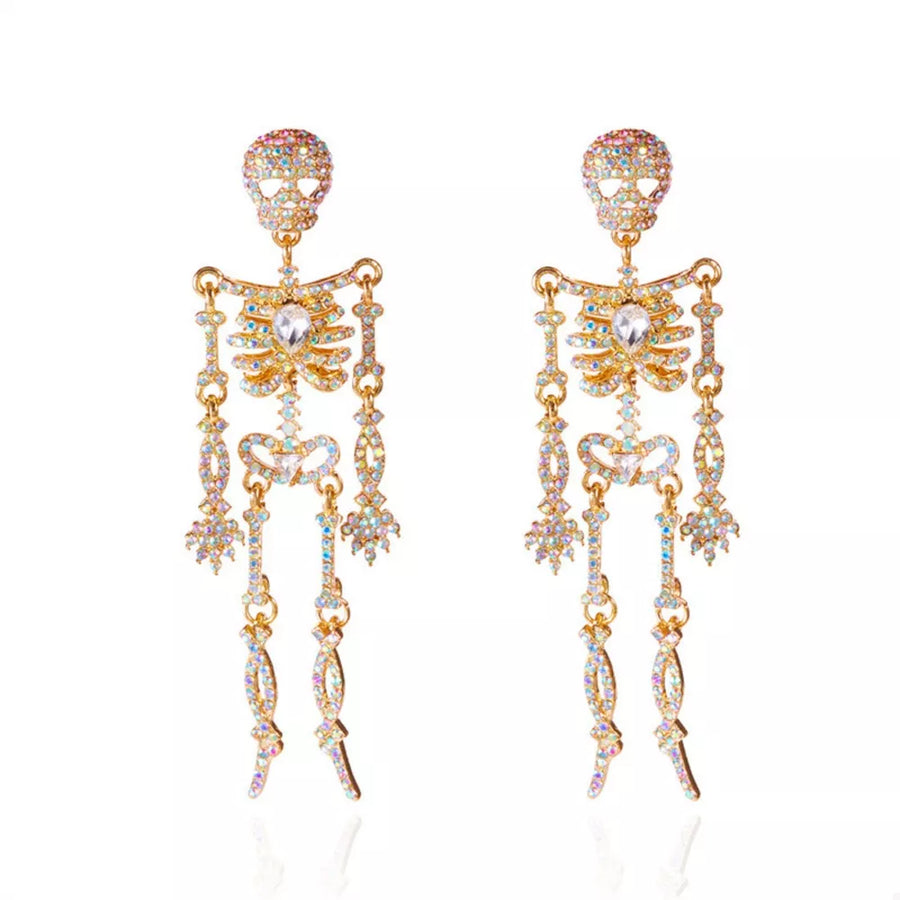 earrings in Gold with skeleton and zircon embellishment