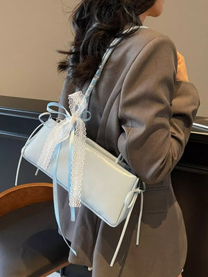 Blue shoulder bag with mini and zip-front