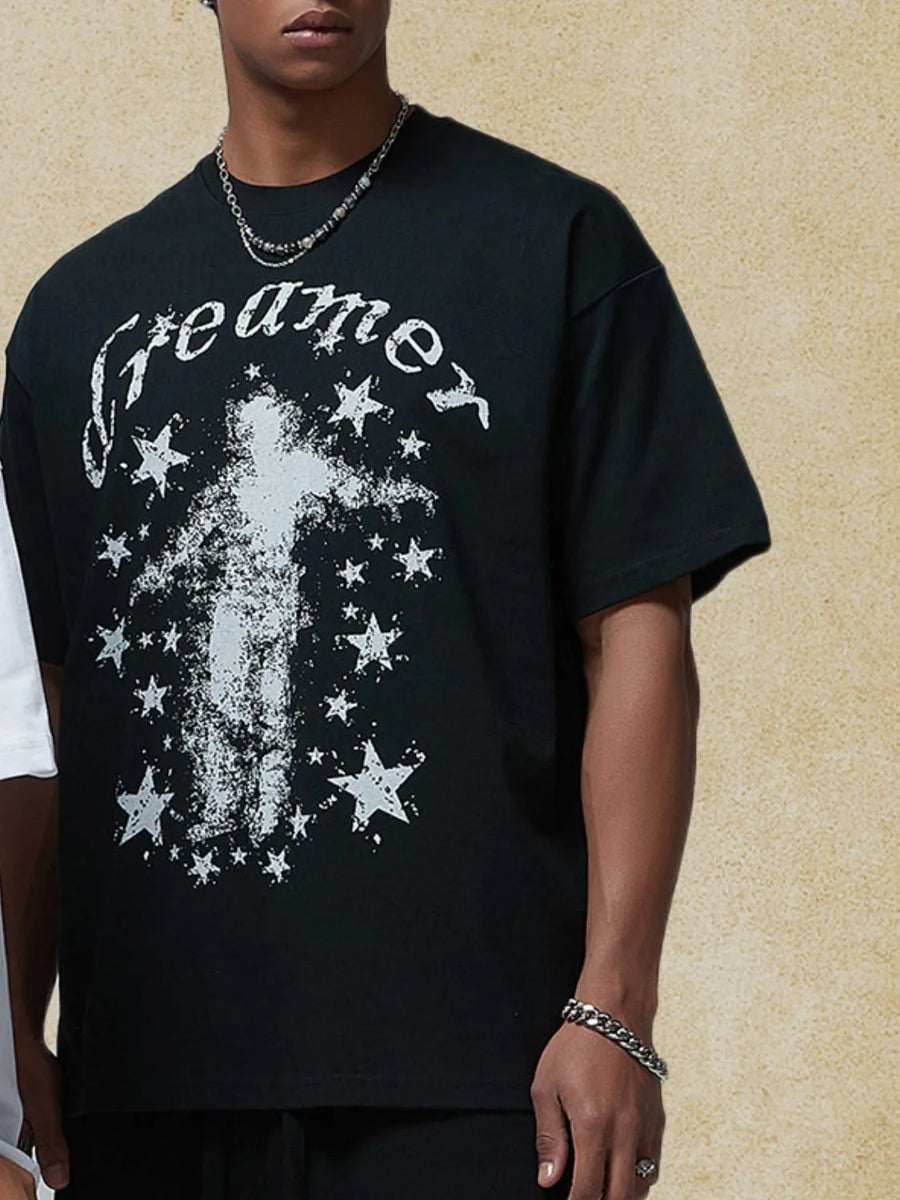 Black graphic t-shirt with a distressed star and figure print and crew neck.