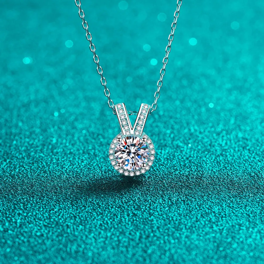 Silver halo diamond pendant necklace with rabbit ear detail on 925 sterling silver chain