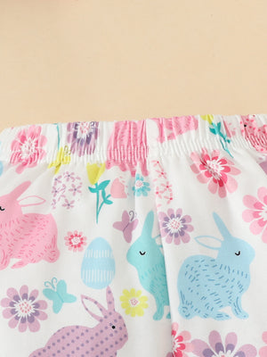 Baby set with white fabric, pink and blue bunnies, flowers, and Easter eggs pattern.