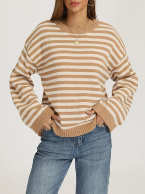 100% polyester Care instructions: Machine wash cold pullover sweater in Red And Pink with relaxed silhouette