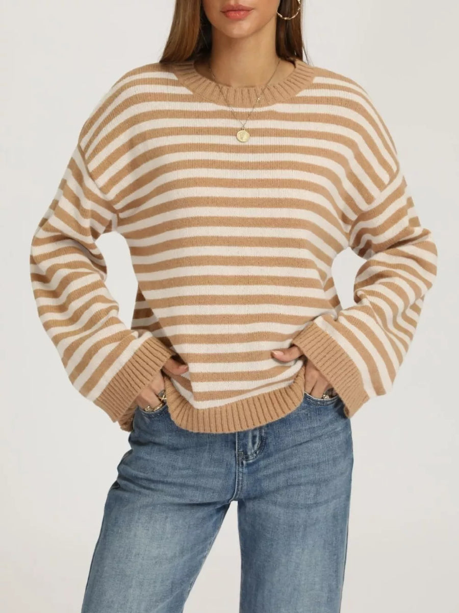100% polyester Care instructions: Machine wash cold pullover sweater in Red And Pink with relaxed silhouette