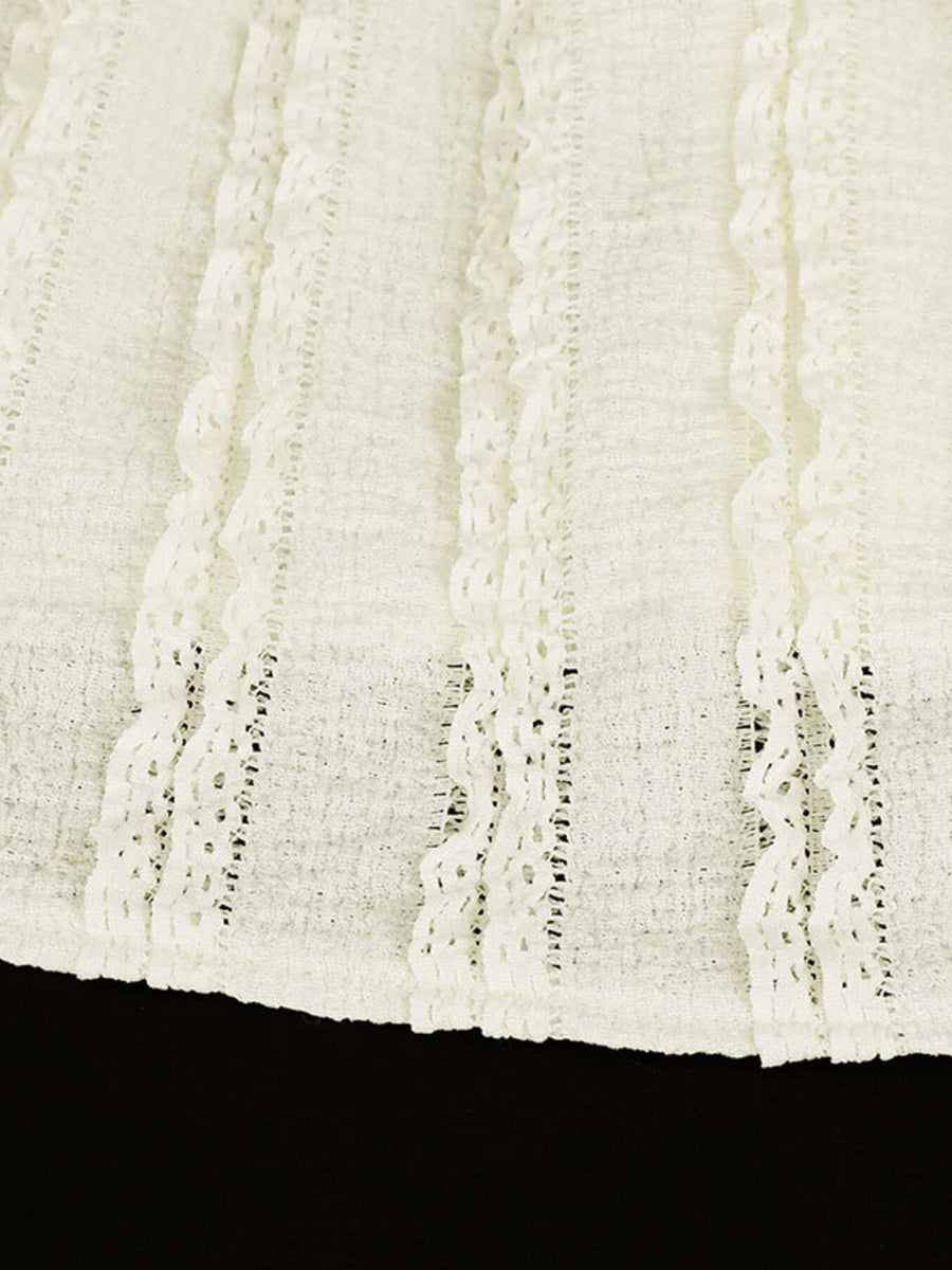 White cami top with vertical textured stripes and lace trim detail