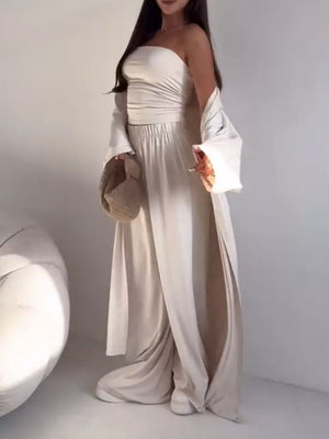 Chic three-piece maternity set in white with a ruched bandeau top, wide-leg pants, and a long cardigan.