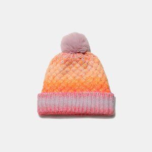 Textured ombre knit beanie with pom in pink and orange gradient colors