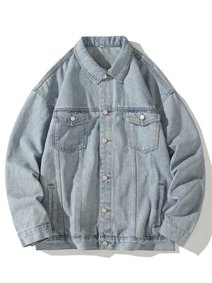 Light blue 100% cotton denim trucker jacket with button-up front and chest pockets.