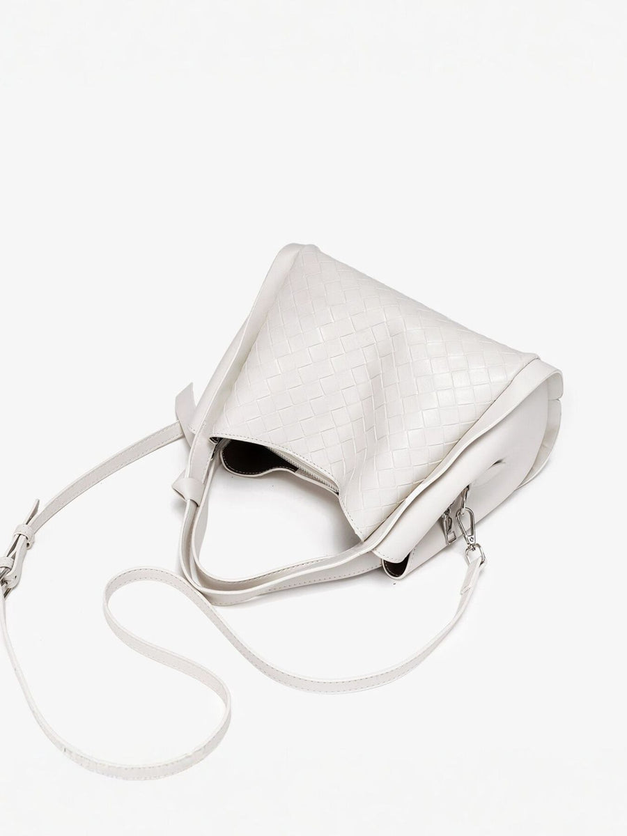cream crossbody bag with zip-top and woven
