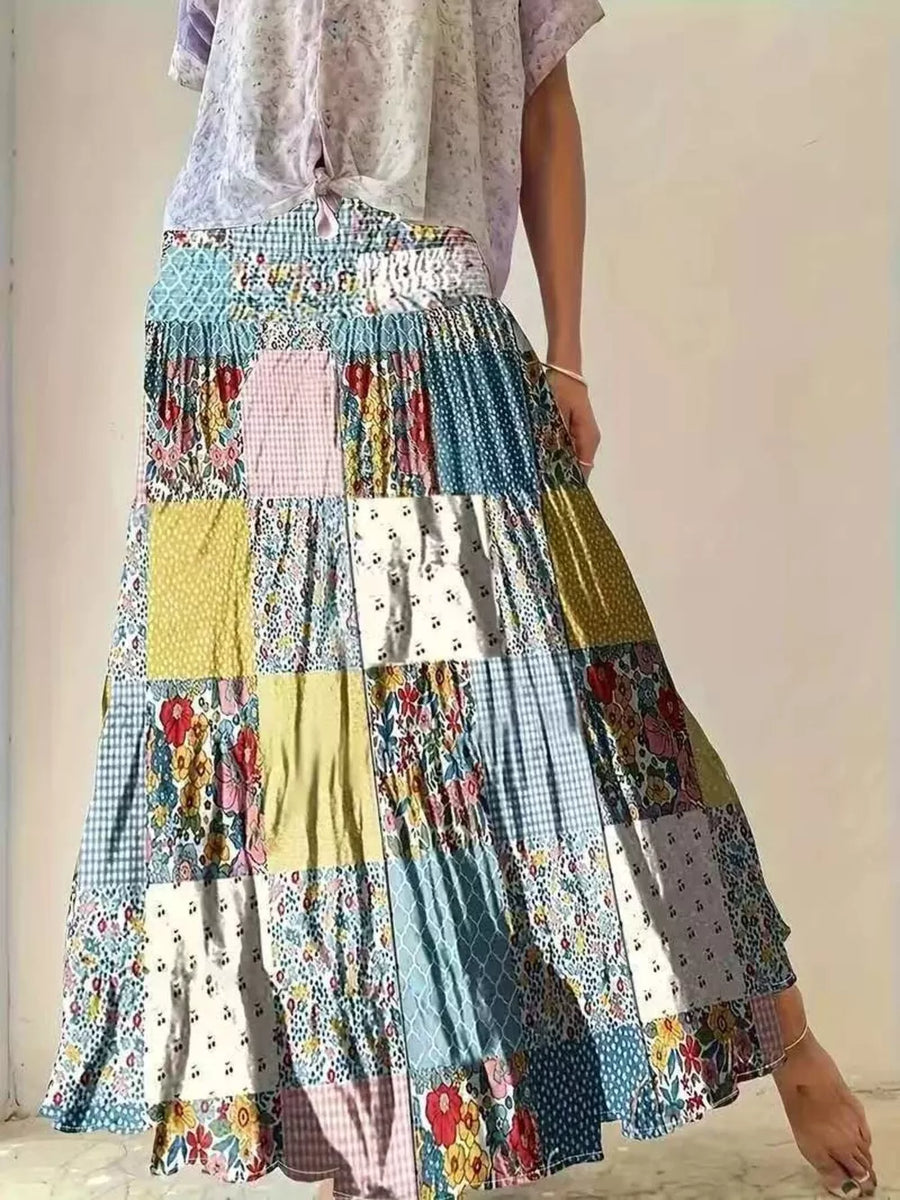 100% polyester Care instructions: Machine wash cold maxi skirt in yellow with flared silhouette