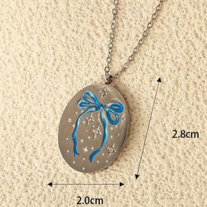silver necklace with lobster clasp and pictorial